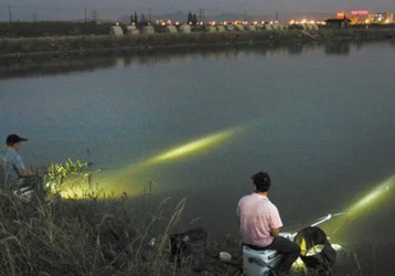 What new experiences can you get when fishing at night using night vision equipment?