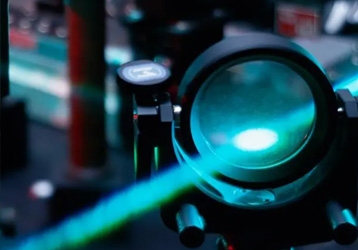 How far can night vision goggles see in total darkness?